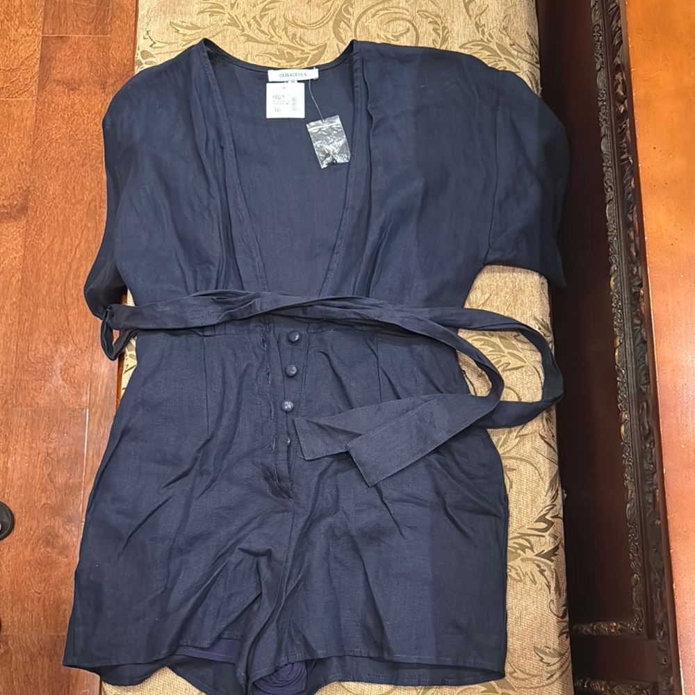 Navy blue linen romper from boutique.